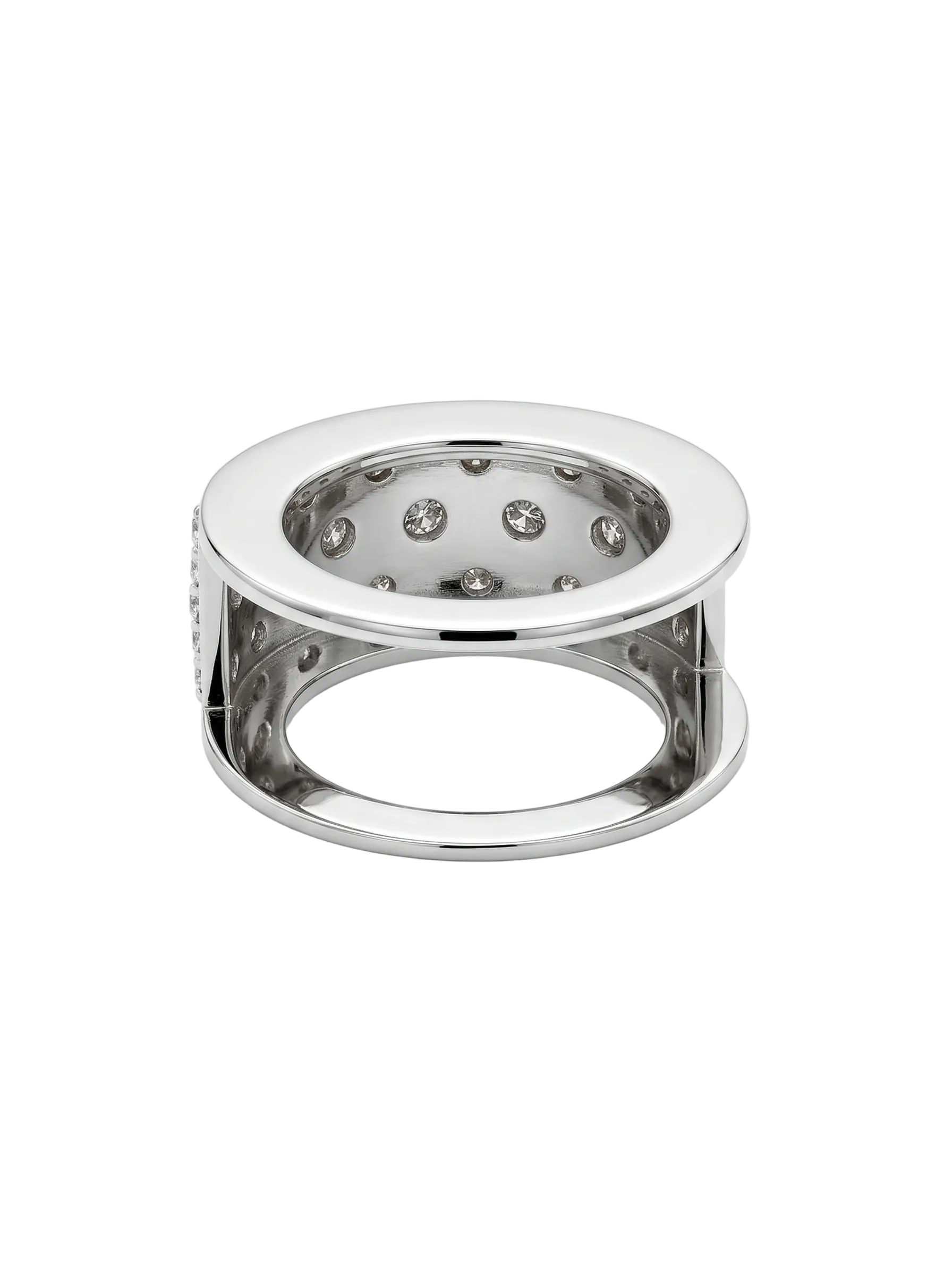 white gold ring with embedded stones on a white background